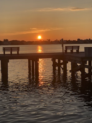 Early risers can walk a block and catch the sunrise over the channel.