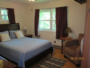 Master bedroom, has a queen bed and full bath attached.