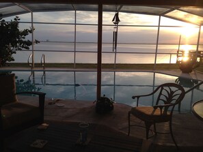 Sunrise view from the patio of Cape Canaveral and Vehicle Assembly Building