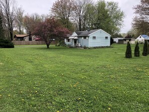 A view from the side yard. 