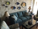 Living room with fish decor.