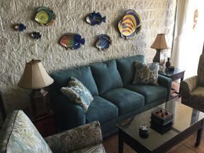 Living room with fish decor.