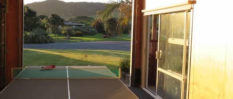 Garage/games room looking out through extra height door.