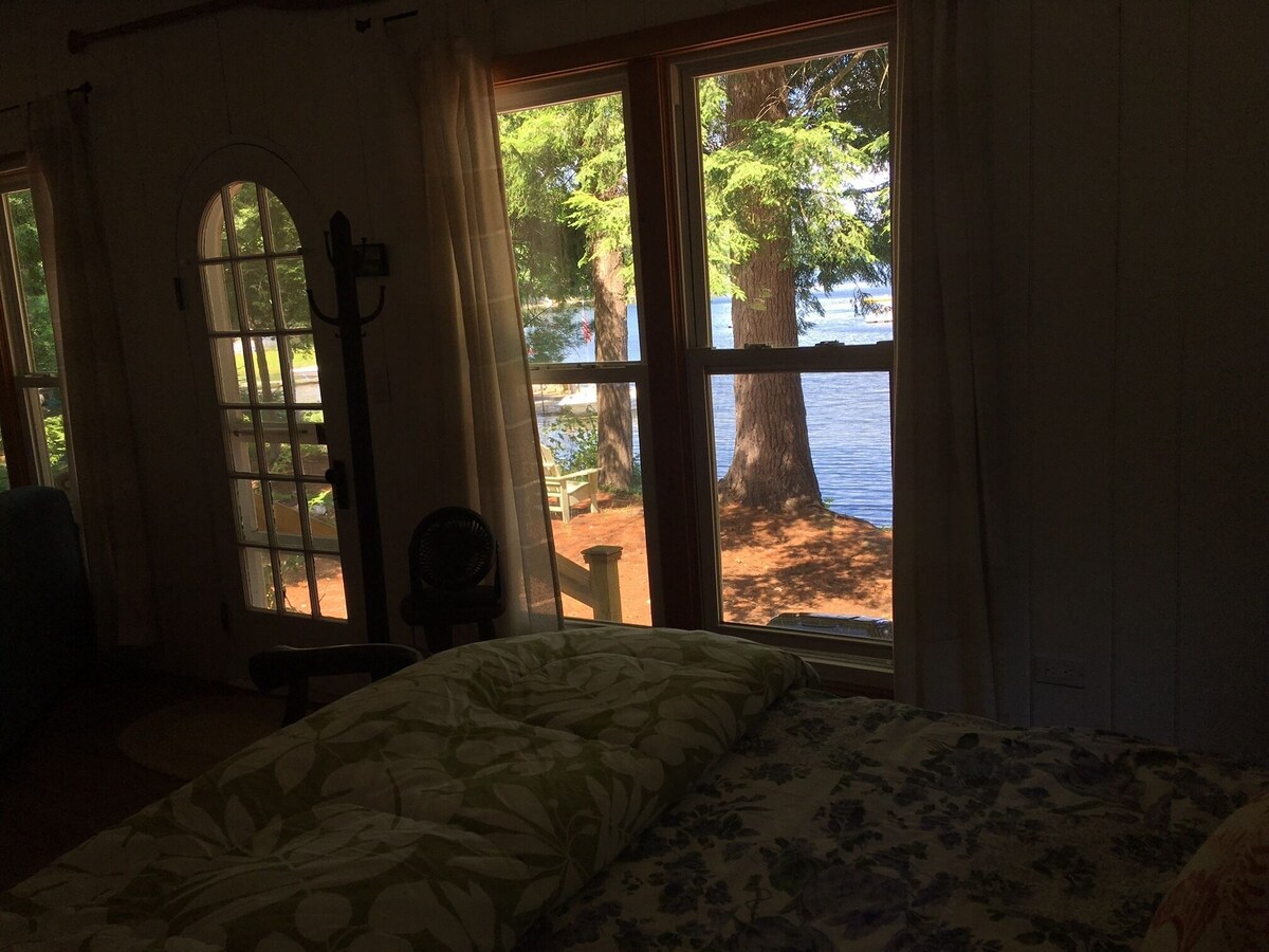 The Wee White Cottage on Tripp Lake in Poland, Maine.