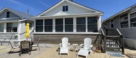 House set in the sand on a private lane with gate and no auto access