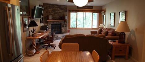 Spacious Living Room, Cozy Fireplace, Large Screen HDTV and great views!!