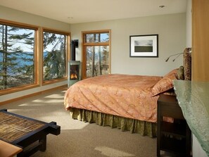 Lovely main bedroom with water view,  fine linens, down duvet, gas fireplace.