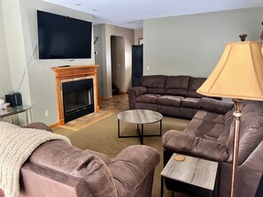 Living room with two sofas and a loveseat.