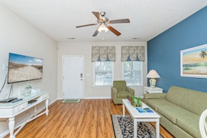 Spacious living room with a 46-inch smart TV