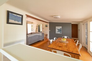 Open plan dining room with split level lounge area