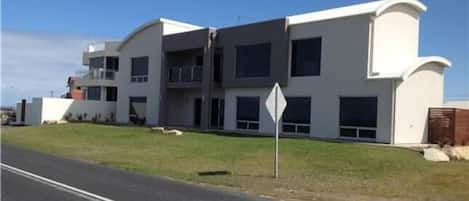 This photo shows the house from the beach aspect