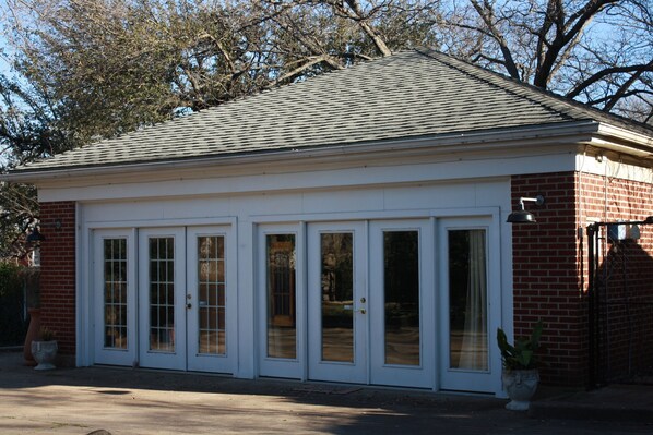 Front of cottage, with designated parking area