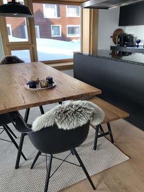 Dining area with open kitchen. 