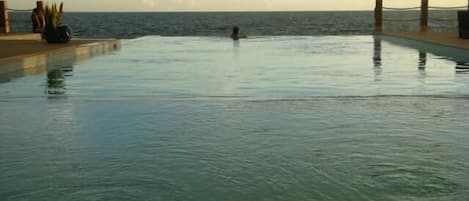 Pool meets the Ocean at sunset