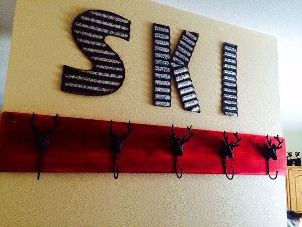 Chalet entrance with cute coat rack :)