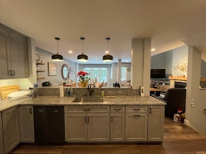 View from kitchen out to dining room. 