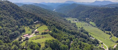 Drone view above cabin. Stekoa Creek in valley