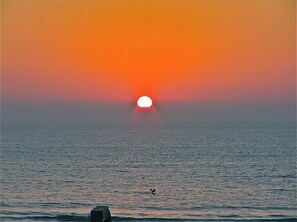SUNSET VIEW FROM INSIDE CONDO.