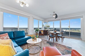 Vacation in light an airy panoramic views in your modern Gulfront condo.