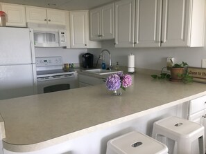 View of the kitchen from the dining room.