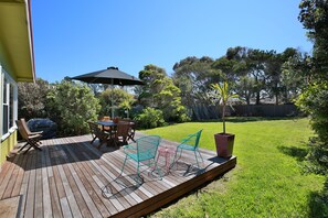 Huge, flat, lawn at back. Perfect for games and dog.