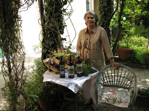 Jennifer with estate wines and olive oil 