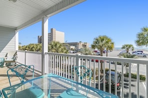 Large front porch with seating to take in the ocean views.