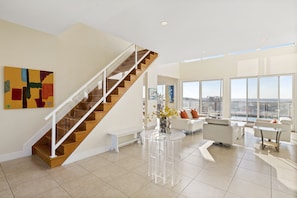 Open foyer area with stairs leading up to the 2nd floor