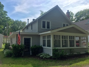 Front of cottage. Side shed to store bikes. 