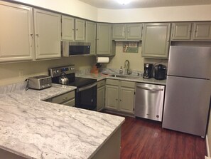 Kitchen with Granite Counter tops.