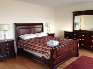 Master bedroom with 1 queen bed, master bath, and balcony; cape ocean vista