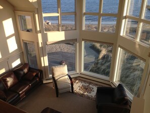 Looking down to living room from loft; capeoceanvista