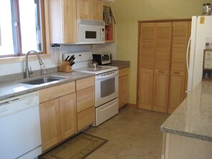 Microwave converts to convection oven, providing 2 baking ovens.