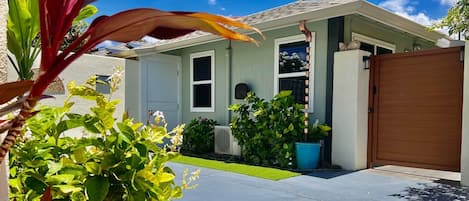 Cottage entrance with private parking.