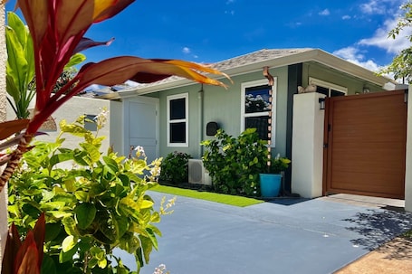 Cottage entrance with private parking.
