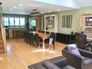 Great room looking toward kitchen and back bay window