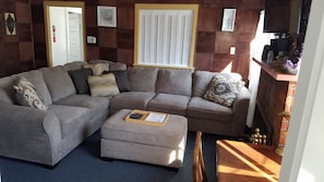 Comfortable Sectional for relaxing at the end of the day with TV and Music