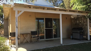 Front entrance to the rammed earth cottage 