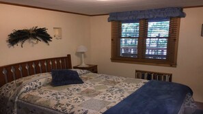 Master bedroom overlooks the lake.