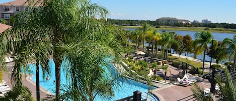 View from balcony of the pool and Lake Cay. Just steps from the clubhouse