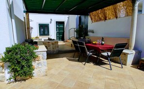 Spacious shaded terrace for outdoor dining