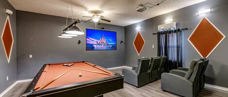 Private movie theater room/ pool table, Simba's Magic by Emerald Island Rentals