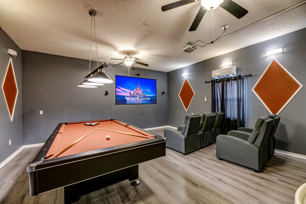 Private movie theater room/ pool table, Simba's Magic by Emerald Island Rentals