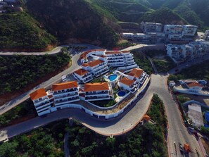 Portofino Development-- condo located on far left side, top of building
