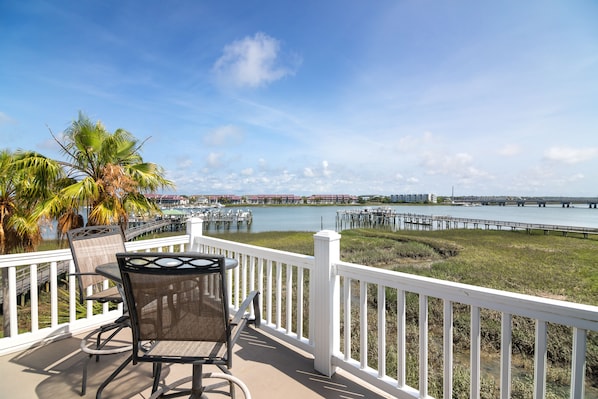 Enjoy the beautiful view of the River from the deck off the Main bedroom upstairs.