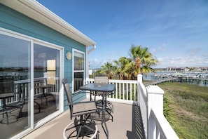 Enjoy the beautiful view of the River from the deck off the Main bedroom upstairs.