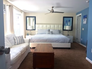 Master bedroom with king sized bed 