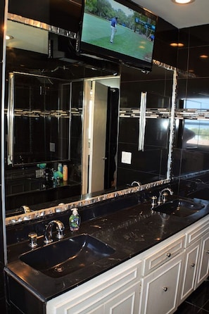 Luxury bathroom, walk in shower, double vanity, whole wall mirror 