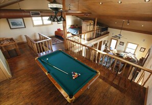 Upstairs Loft with full size pool table and foozball table.