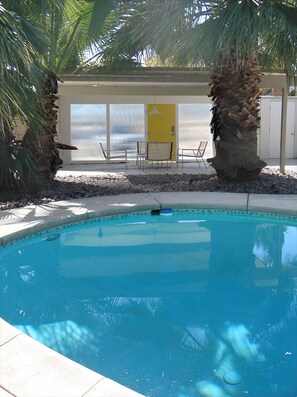 Pool and covered patio with frosted resin panels